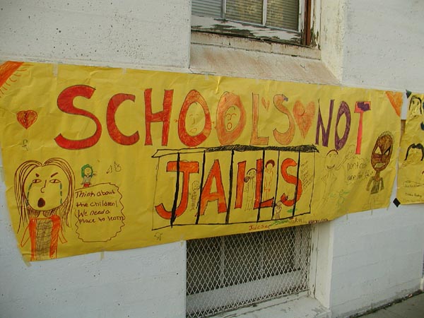 3_schools_not_jails.jpg 