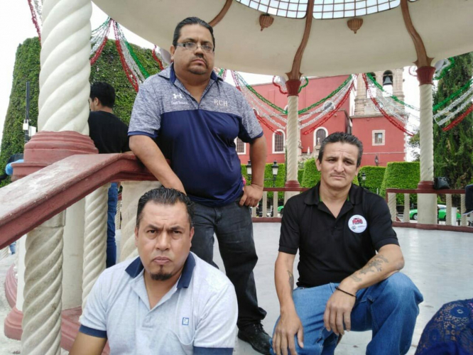 sm_mexico_gm_3_fired_workers.jpg 