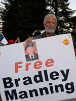 Demonstrators ask, "What about the War Crimes?" at Free Bradley Manning Protest