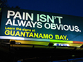 Corrected Billboard "Defends" Transparency at Guantanamo Bay