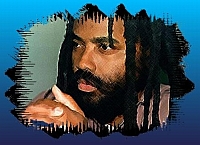 Una entrevista a Mumia Abu-Jamal para el Block Report por el Ministro de Información J.R y el presidente Fred Hampton, hijo, del Comité de Pres@s de Consciencia (POCC)