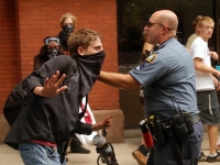 200_cop_confronting_young_man_1-ps.jpg