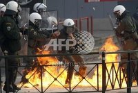 The riot police headquarters in Zografou, Athens were attacked earlier today, with one riot police van and a few cars burnt.nnIndymedia reports that the state-run TV station NET was occupied for a f