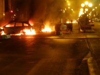 The riot police headquarters in Zografou, Athens were attacked earlier today, with one riot police van and a few cars burnt.nnIndymedia reports that the state-run TV station NET was occupied for a f