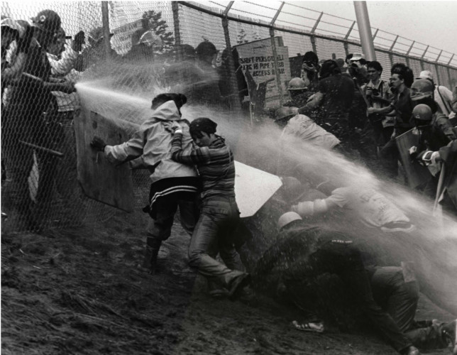 Bitter tear gas clawed at our eyes as National Guard clubs smashed against our frames. Several thousand arrived in this little New Hampsh...