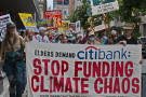 Elders bring their rocking chairs  for sit-in protest at Citibank, the largest fossil fuel investor