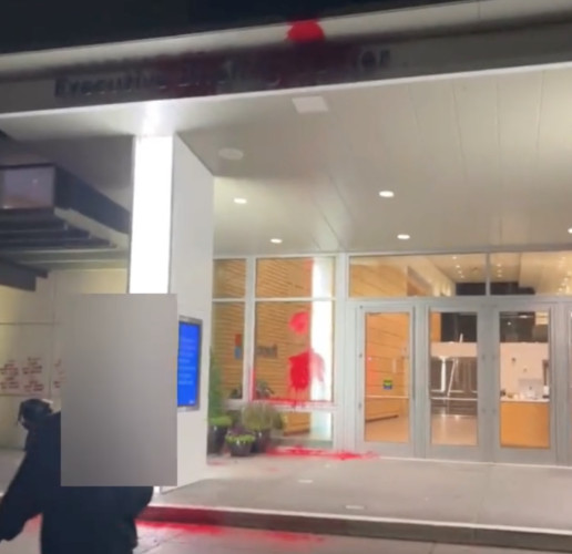 Enrty way of the Microsoft Executive Briefing Center with red paint splattered on the door and overhang