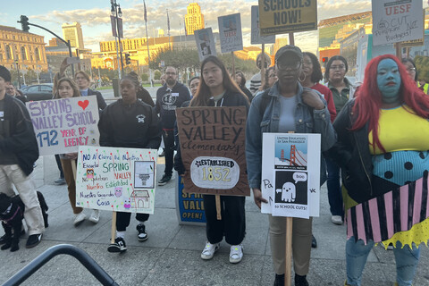 Teachers At Rally With Placards