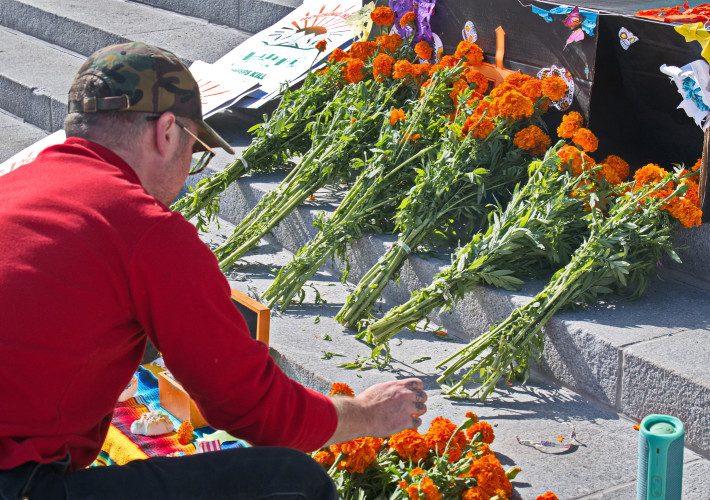 Victims of unhoused encampment sweeps remembered in City Hall observance