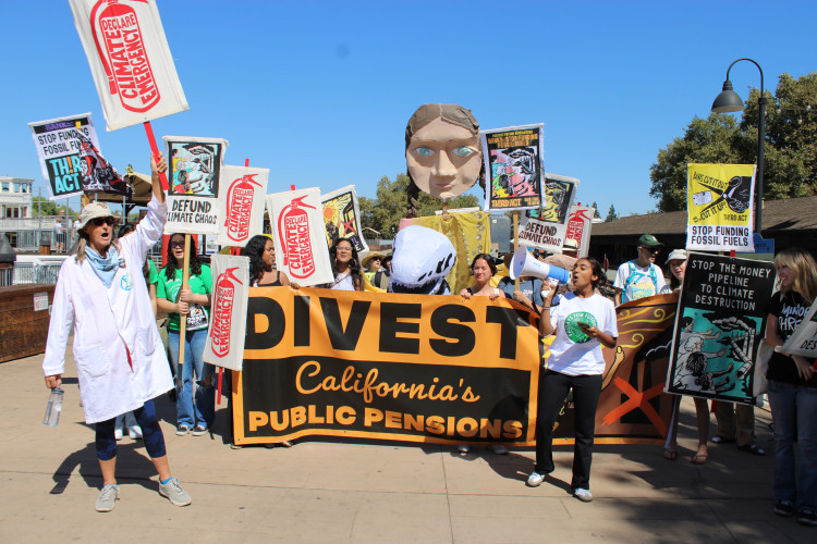 Climate protest against CalSTRS investments in oil corporations on Sept. 21, 2024 in Old Town Sacramento.