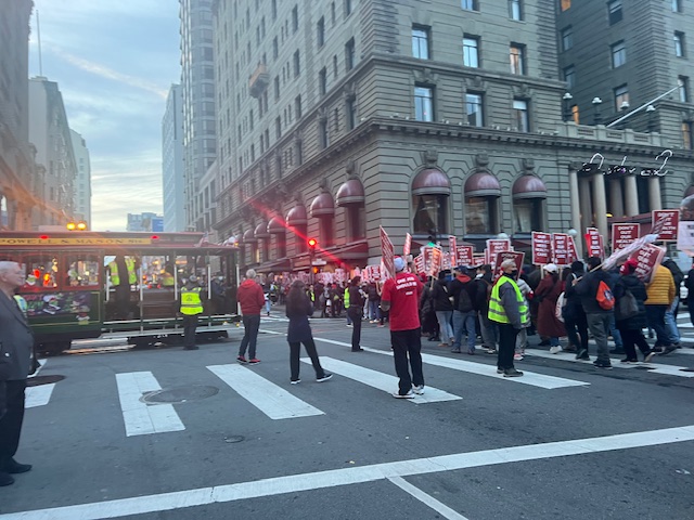 Over 1,000 striking Unite Here Local 2 hotel workers rallied and marched in Downtown San Francisco. Two leaders President Lizzy Tapia and...