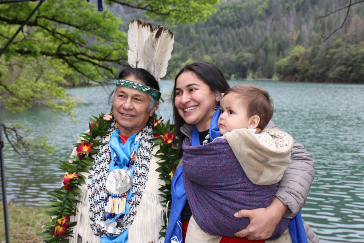 Caleen Sisk, Chief of the Winnemem Wintu Tribe, and Niria Garcia and her child at the McCloud River Bridge Campground. Photo by Dan Bacher 