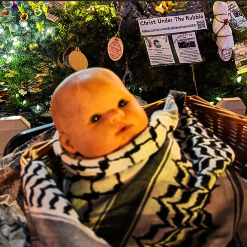 Responding to a call to action from the BDS Movement, community members from Vigil 4 Gaza stood up for Palestine by placing a baby Jesus ...