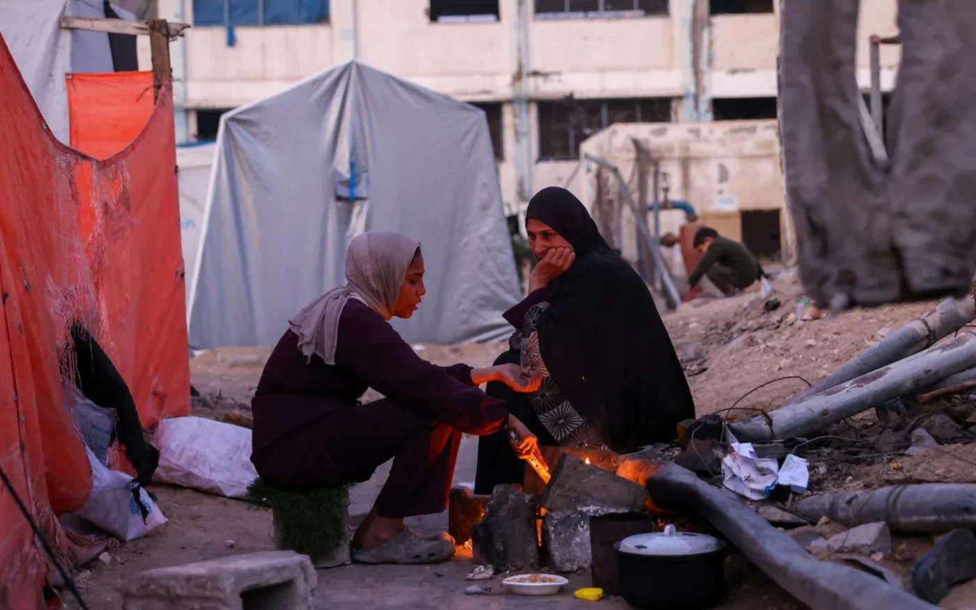 Women try to keep warm