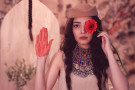 Image showing woman with flower and red hand